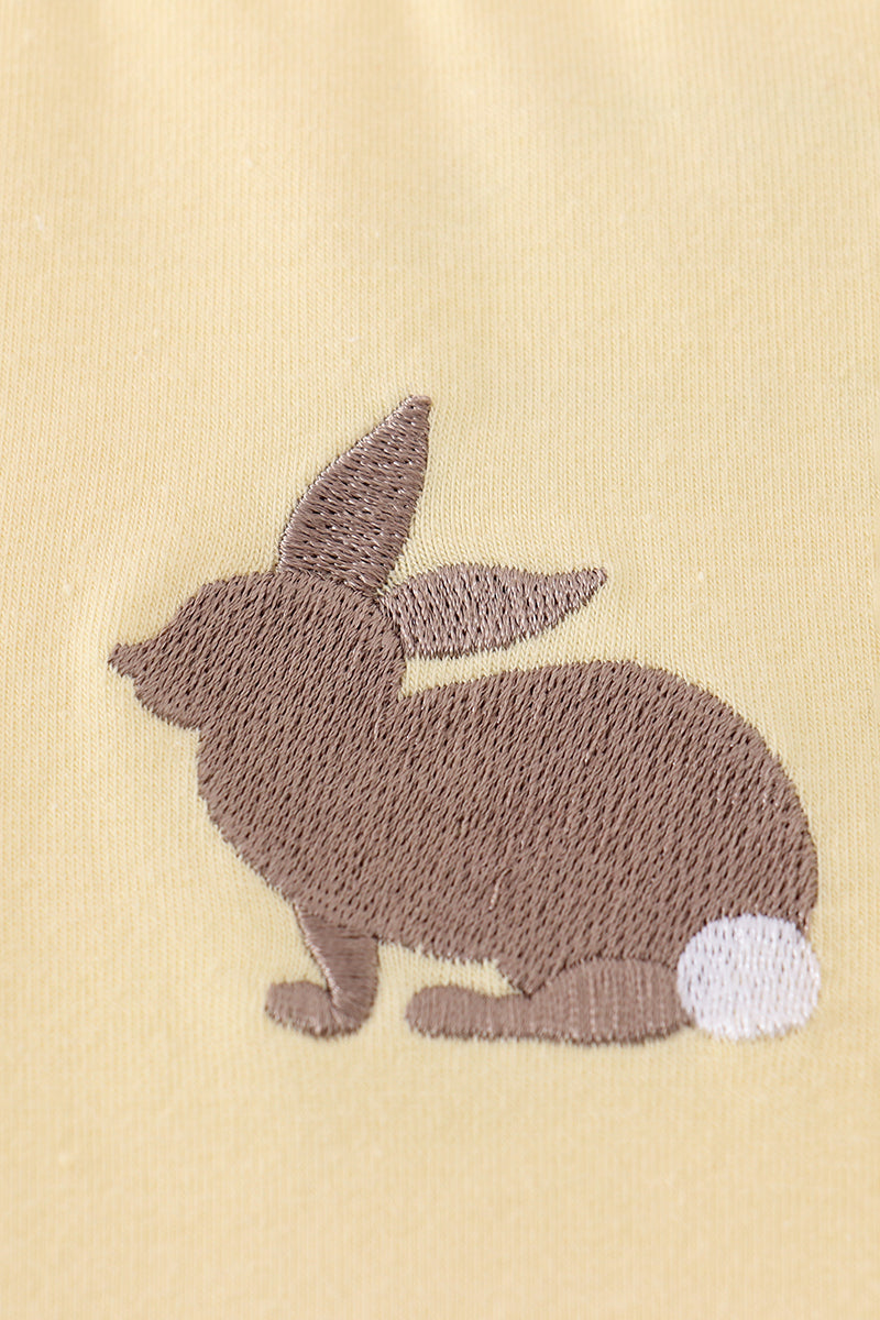 Warm mustard-colored children's top featuring a cute bunny and egg embroidery.