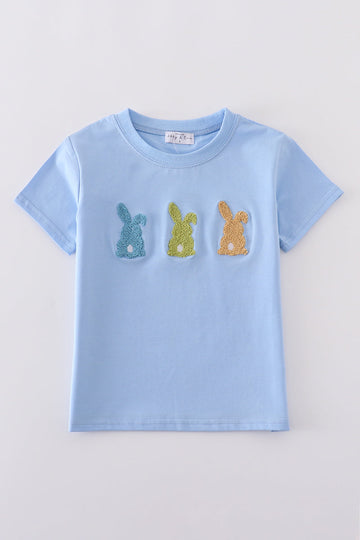 Cozy blue top with adorable bunny embroidery, perfect for playful adventures.