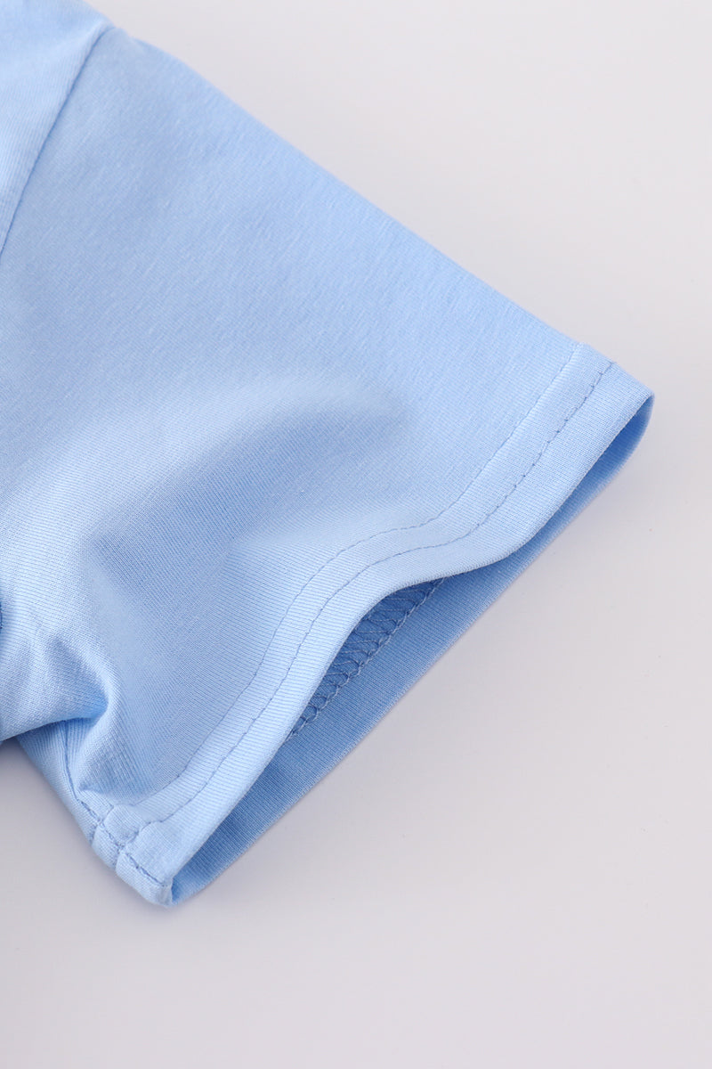 Cozy blue top with adorable bunny embroidery, perfect for playful adventures.