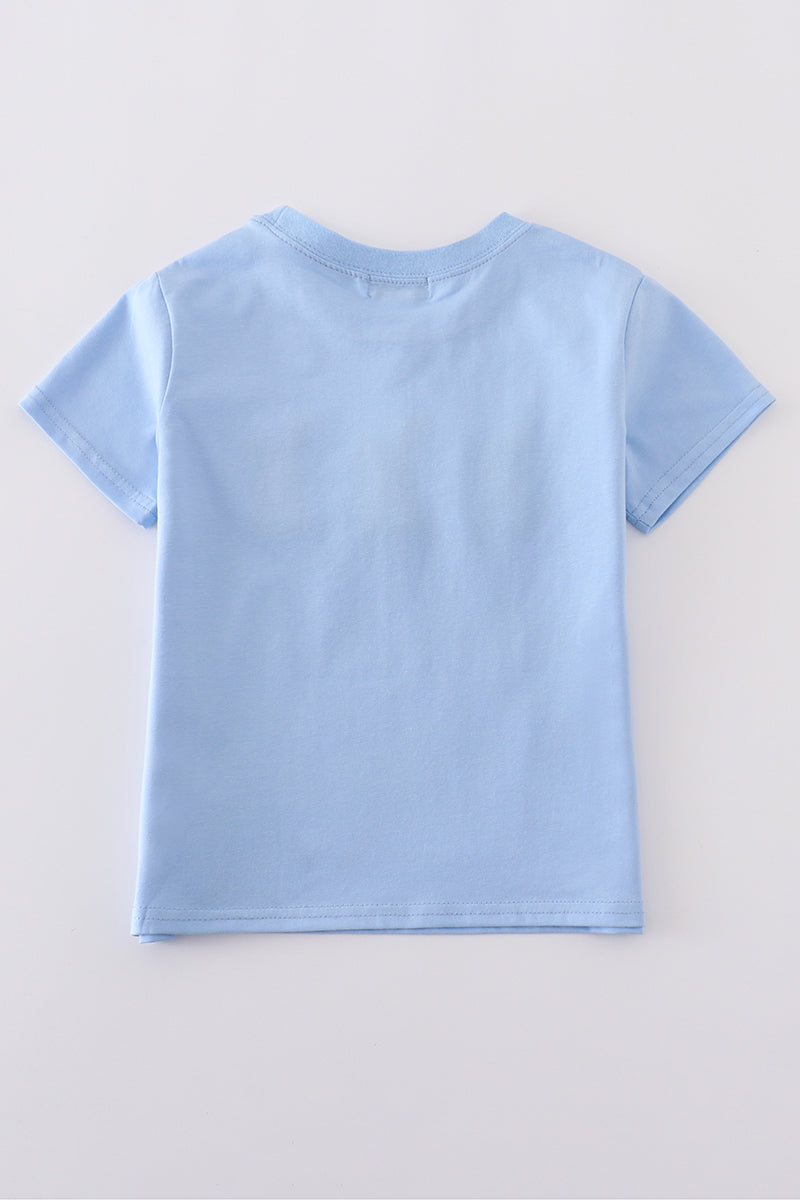 Cozy blue top with adorable bunny embroidery, perfect for playful adventures.