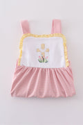 A charming pink dress with delicate cross embroidery, perfect for special occasions.