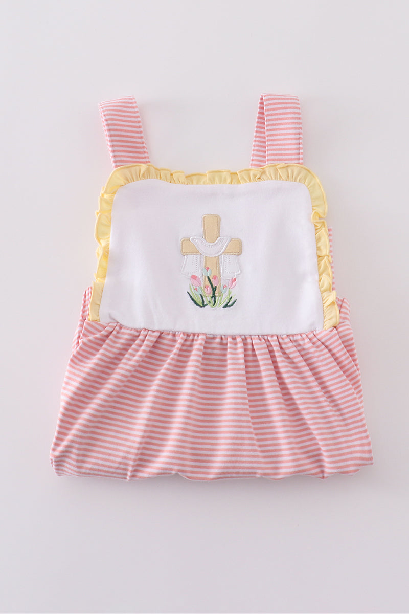 A charming pink dress with delicate cross embroidery, perfect for special occasions.