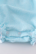 A mint gingham bubble romper with cute bunny and egg embroidery.
