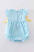 A mint gingham bubble romper with cute bunny and egg embroidery.