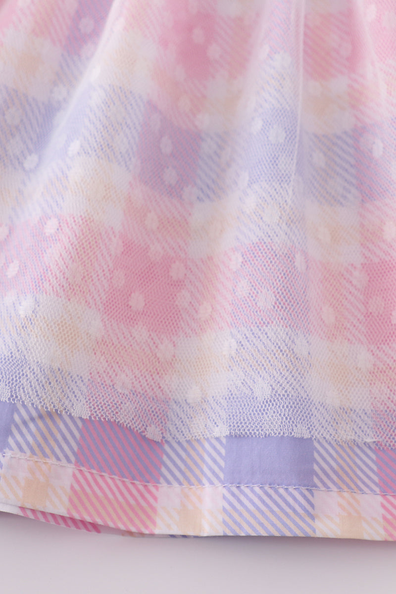 A charming pink plaid dress with bunny bow accents, perfect for springtime fun.