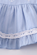 Cozy blue romper with charming cross embroidery, perfect for little ones.