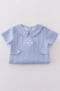 Cozy blue romper with charming cross embroidery, perfect for playful adventures.