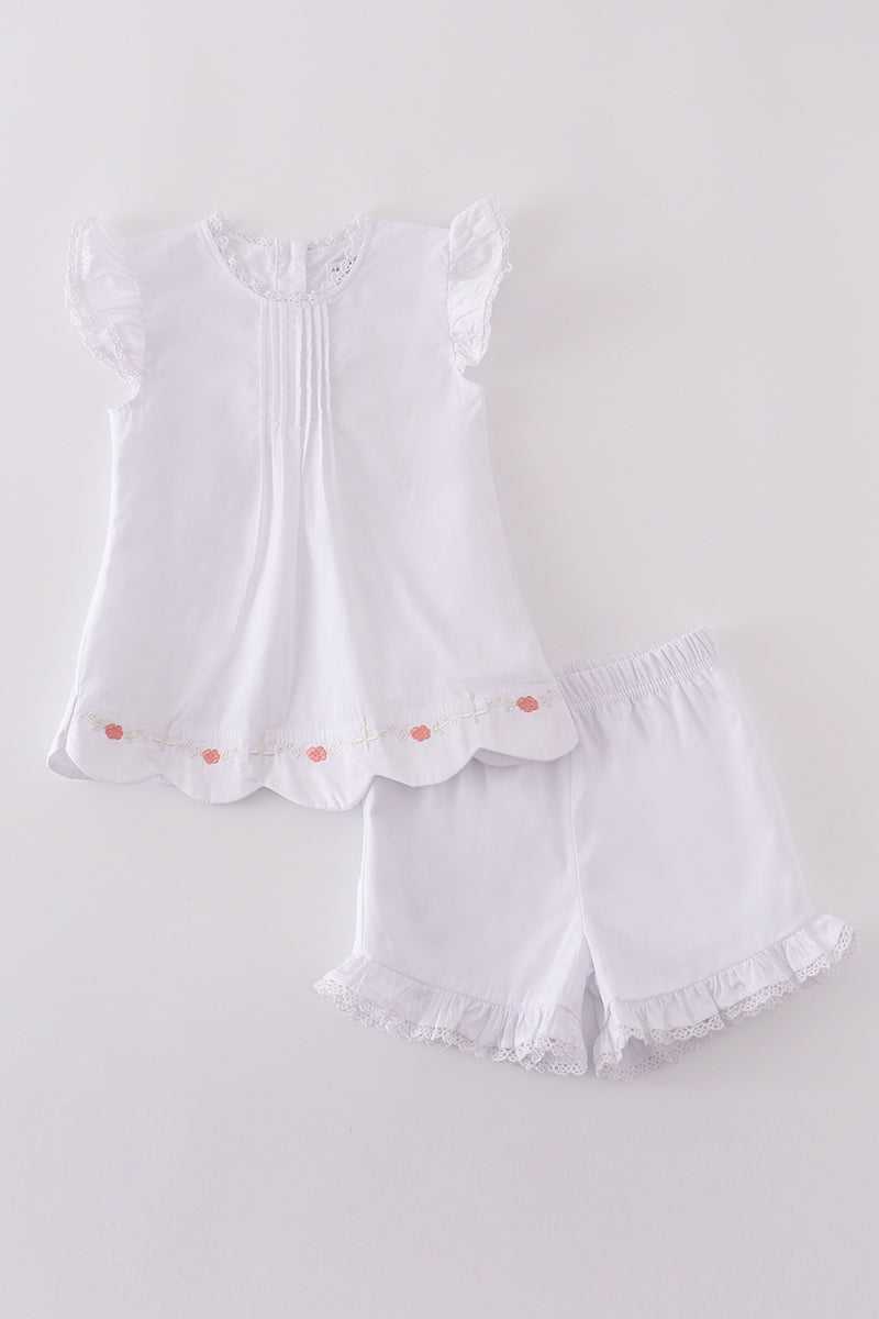 Premium white floral embroidery set: cozy top and pants for playful days.
