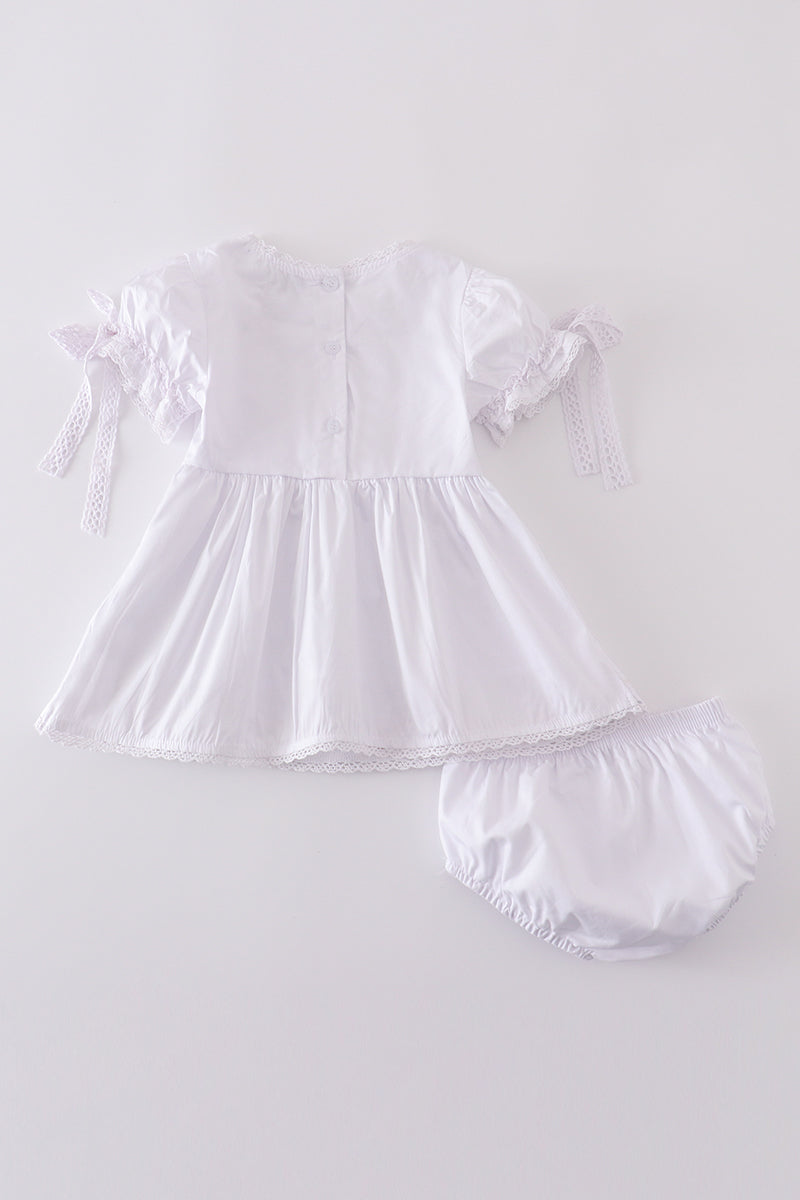 Premium white bloomer set with delicate floral embroidery, perfect for spring outings.