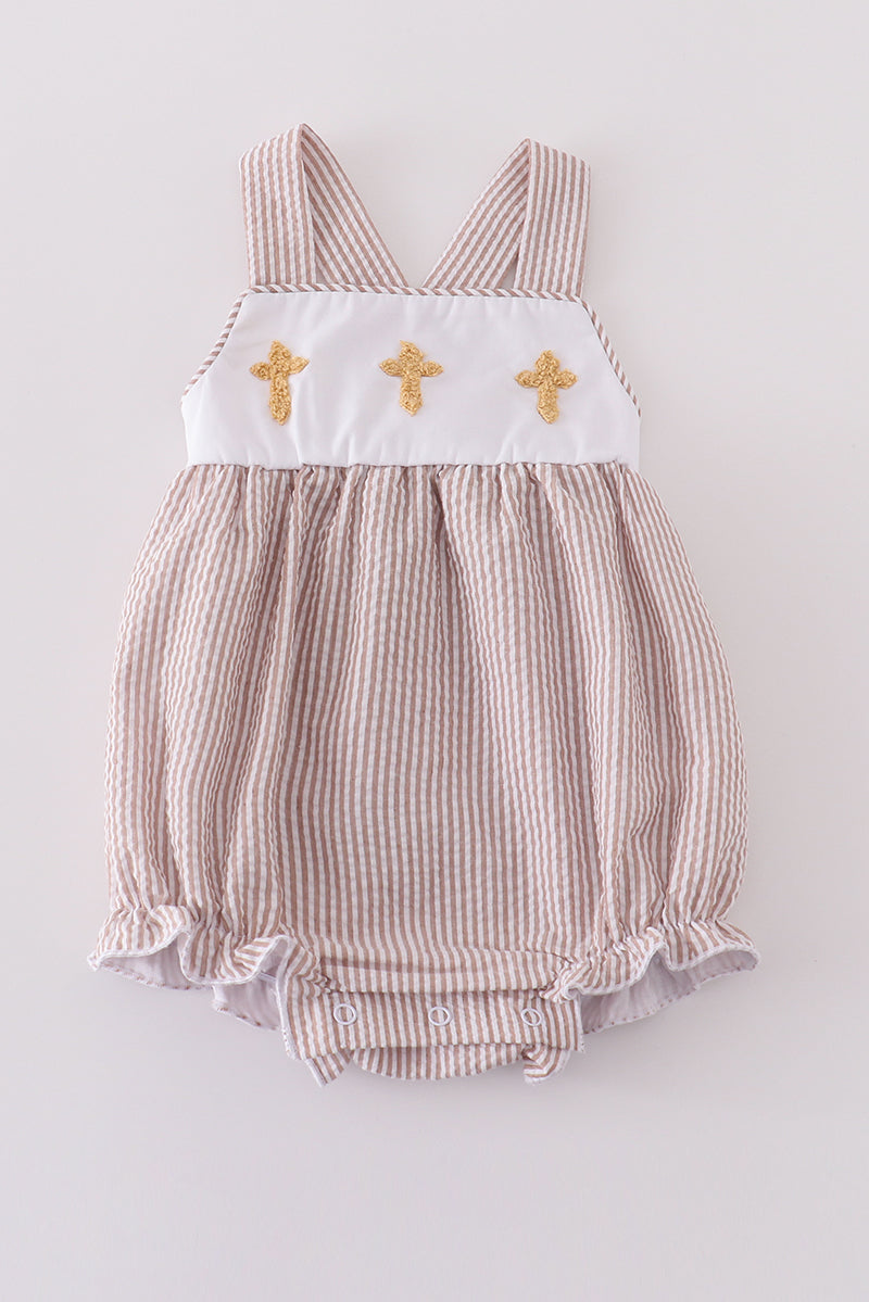 Premium brown bubble romper with charming cross embroidery, perfect for cozy playtime.