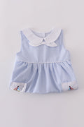 Premium blue dress with sailboat embroidery, perfect for a sunny day adventure.