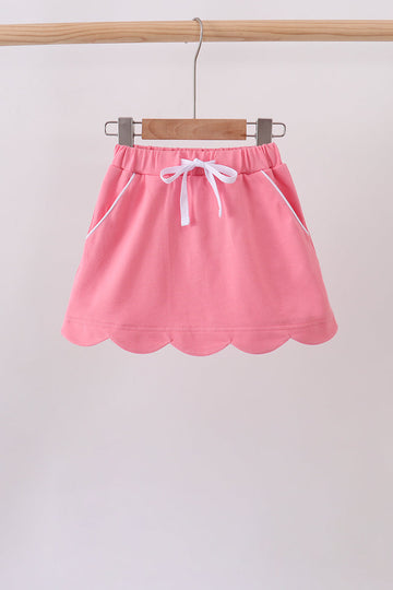 Deep pink scallop hem bow skort