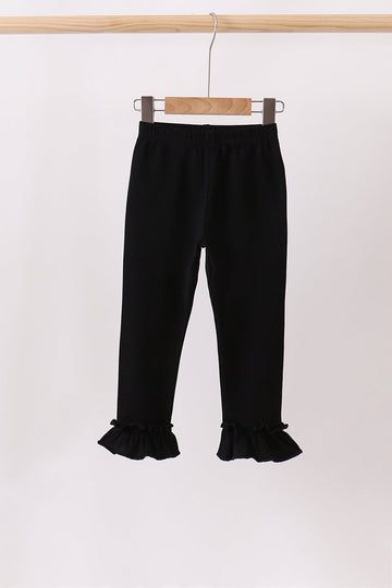 Black ruffle pants