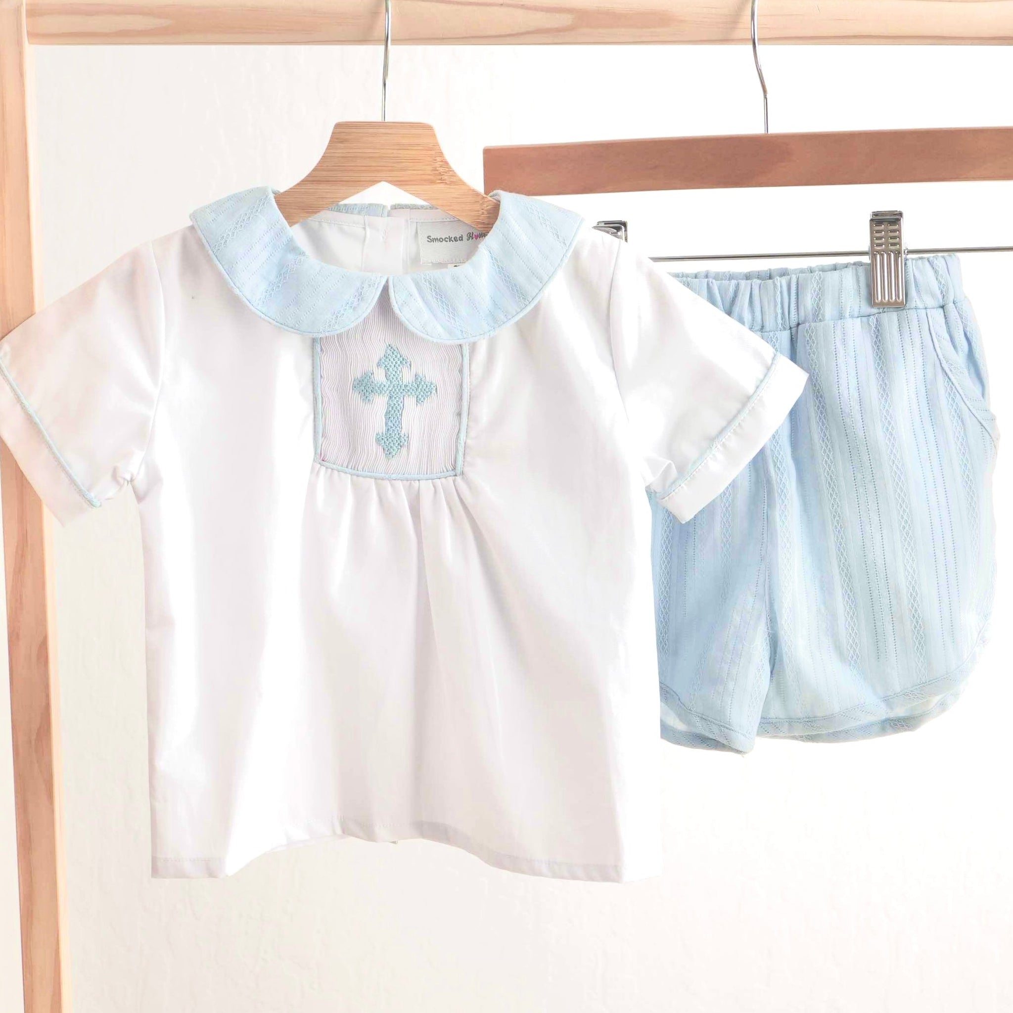 Blue Easter cross hand-smocked boy set with charming, detailed embroidery.