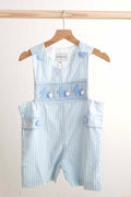 Blue Easter bunny hand-smocked jonjon with playful bunny pattern for boys.