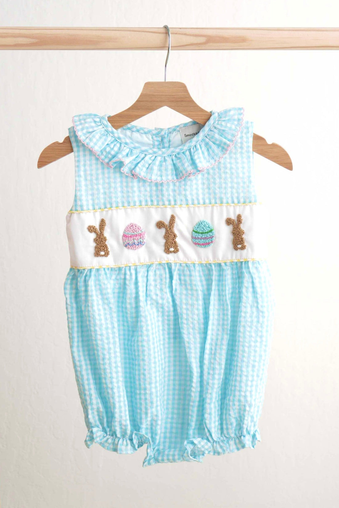 Blue gingham seersucker bubble with Easter bunny and egg French knot embroidery.
