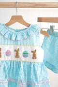 Blue gingham seersucker set with Easter bunny and egg embroidery, perfect for spring.