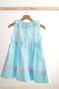Blue gingham seersucker dress with Easter bunny and egg French knot design.