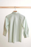 Sage green button-down shirt for boys, perfect for casual or formal occasions.