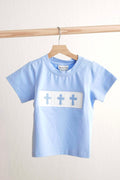 Blue Easter cross hand-smocked boy top with short sleeves and playful design.