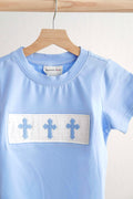 Blue Easter cross hand-smocked boy top with short sleeves and playful design.
