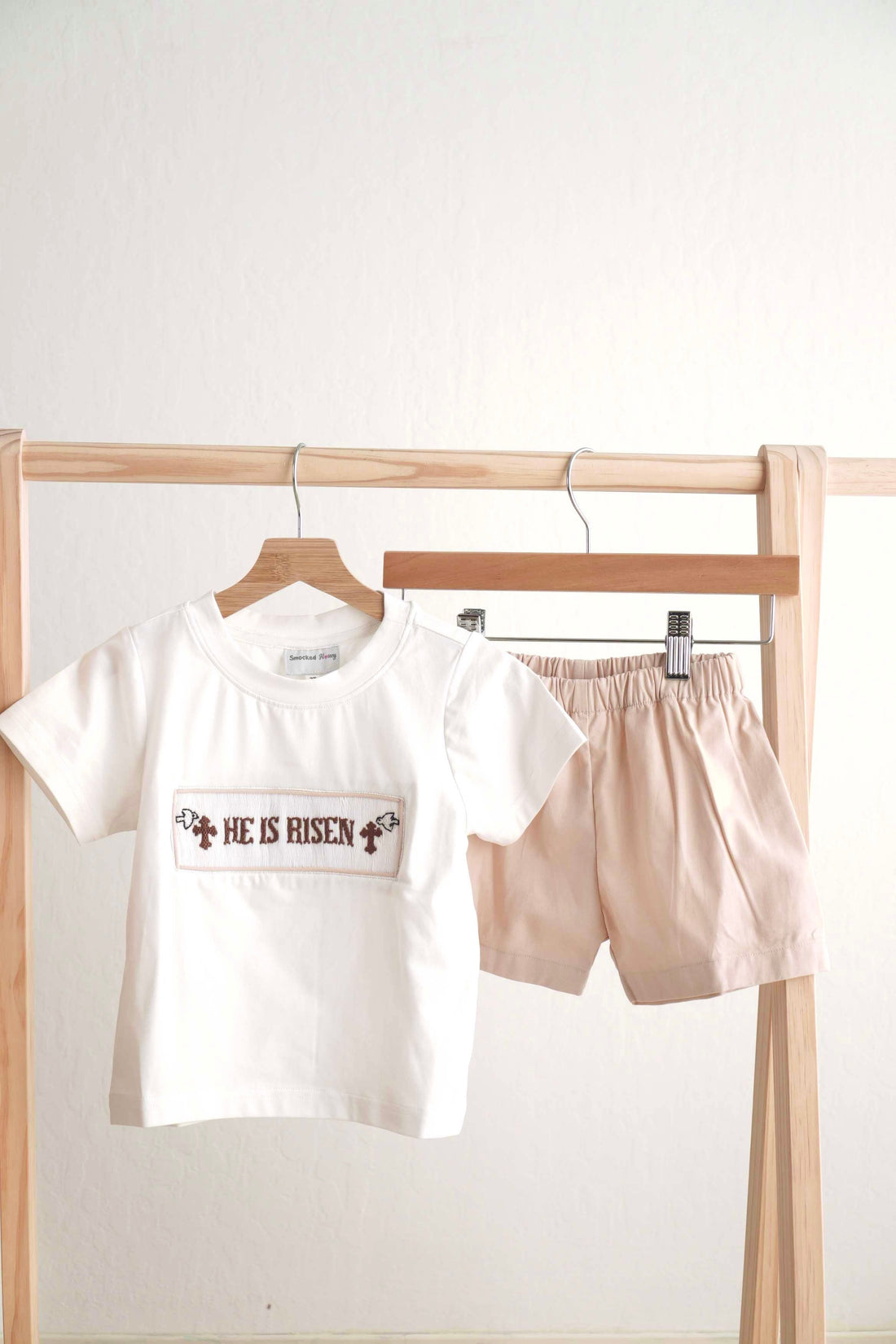 Khaki hand-smocked boy set with "He is Risen" embroidery, perfect for Easter.