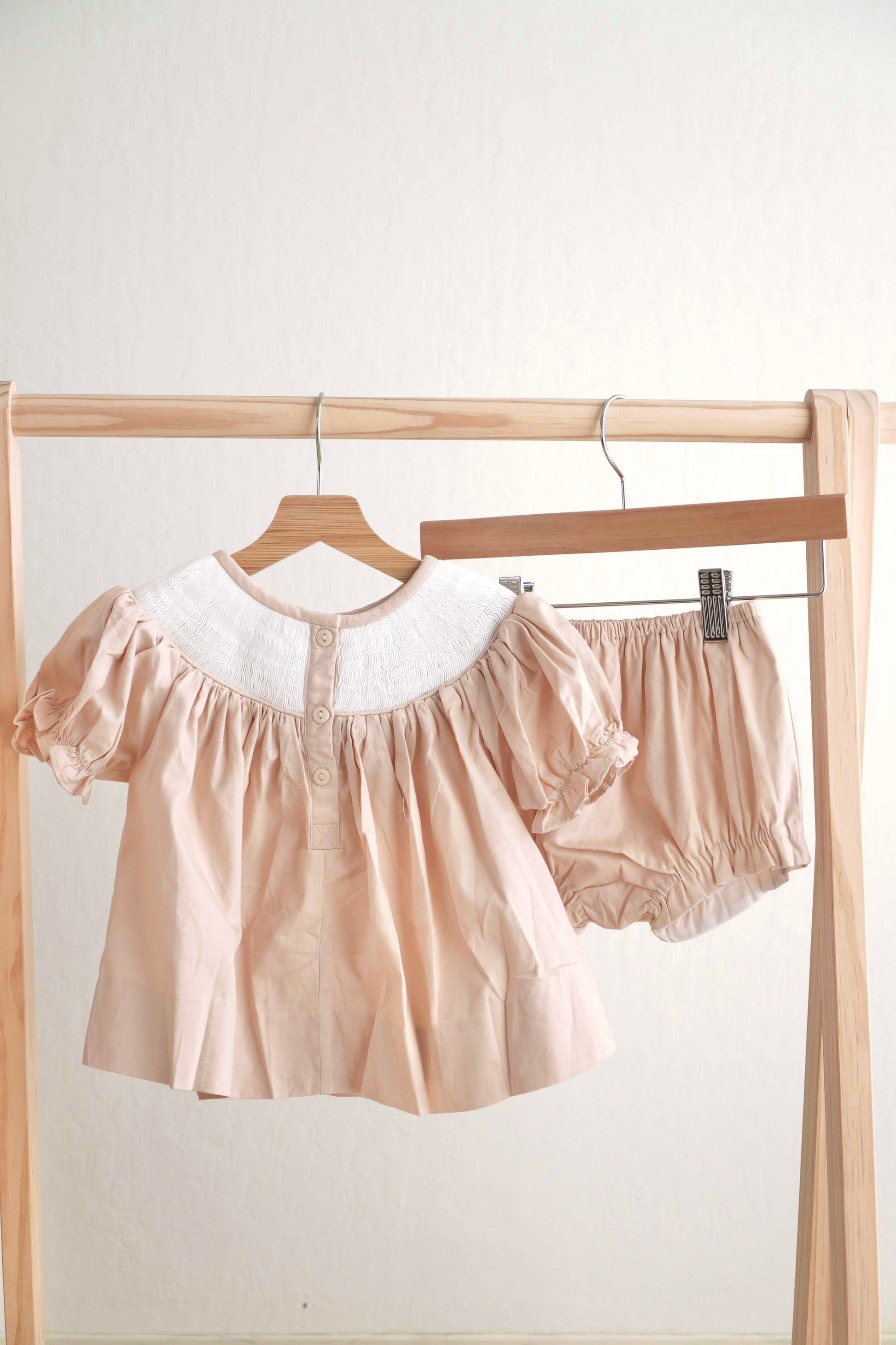 Khaki girl bloomer set with hand-smocked "He is Risen" design, perfect for Easter.