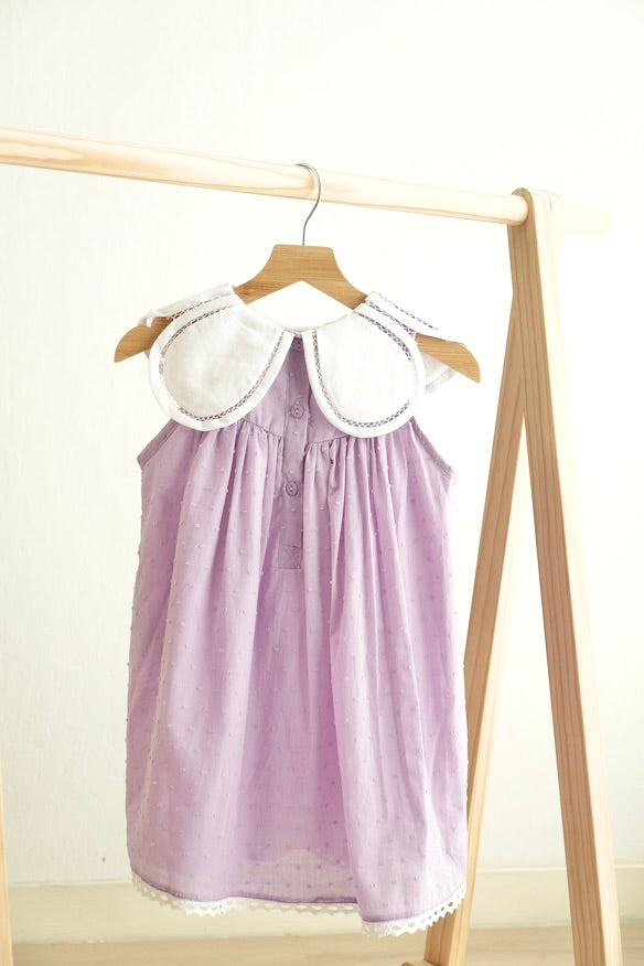 Lavender floral dress with bow embroidery and swiss dot pattern for girls.