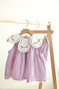 Lavender floral embroidered girl bloomer set with Swiss dots and bow detail.