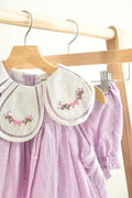 Lavender floral embroidered girl bloomer set with Swiss dots and bow detail.