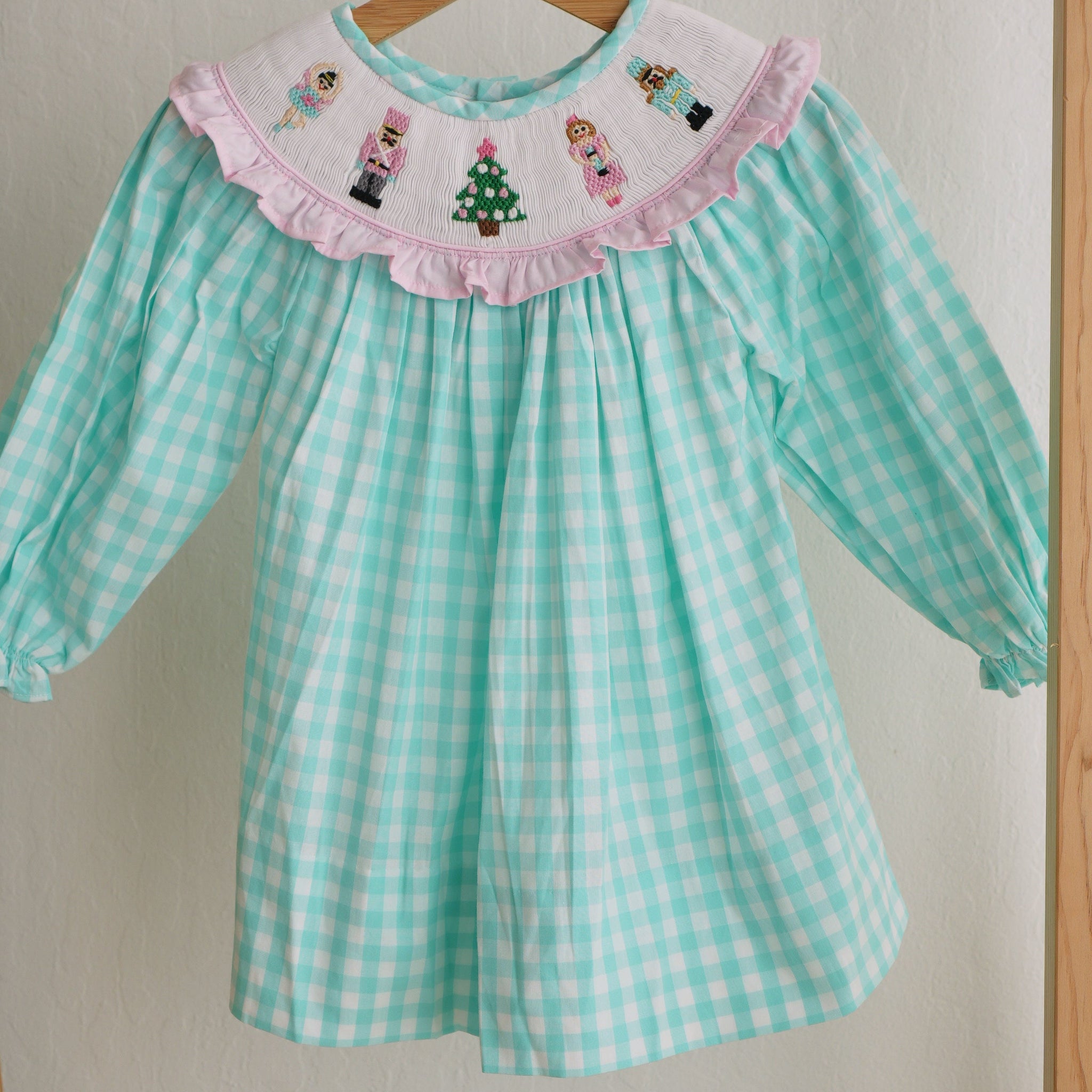 Mint christmas nutcracker hand smocked gingham dress