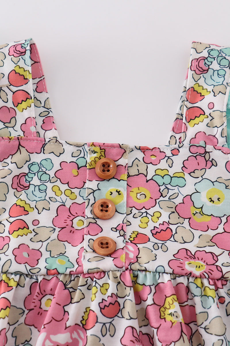 Pink floral print bubble romper with ruffled sleeves, perfect for spring outings.