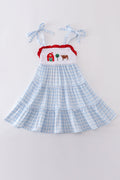 A charming blue tiered dress with playful farm-themed embroidery, perfect for kids.