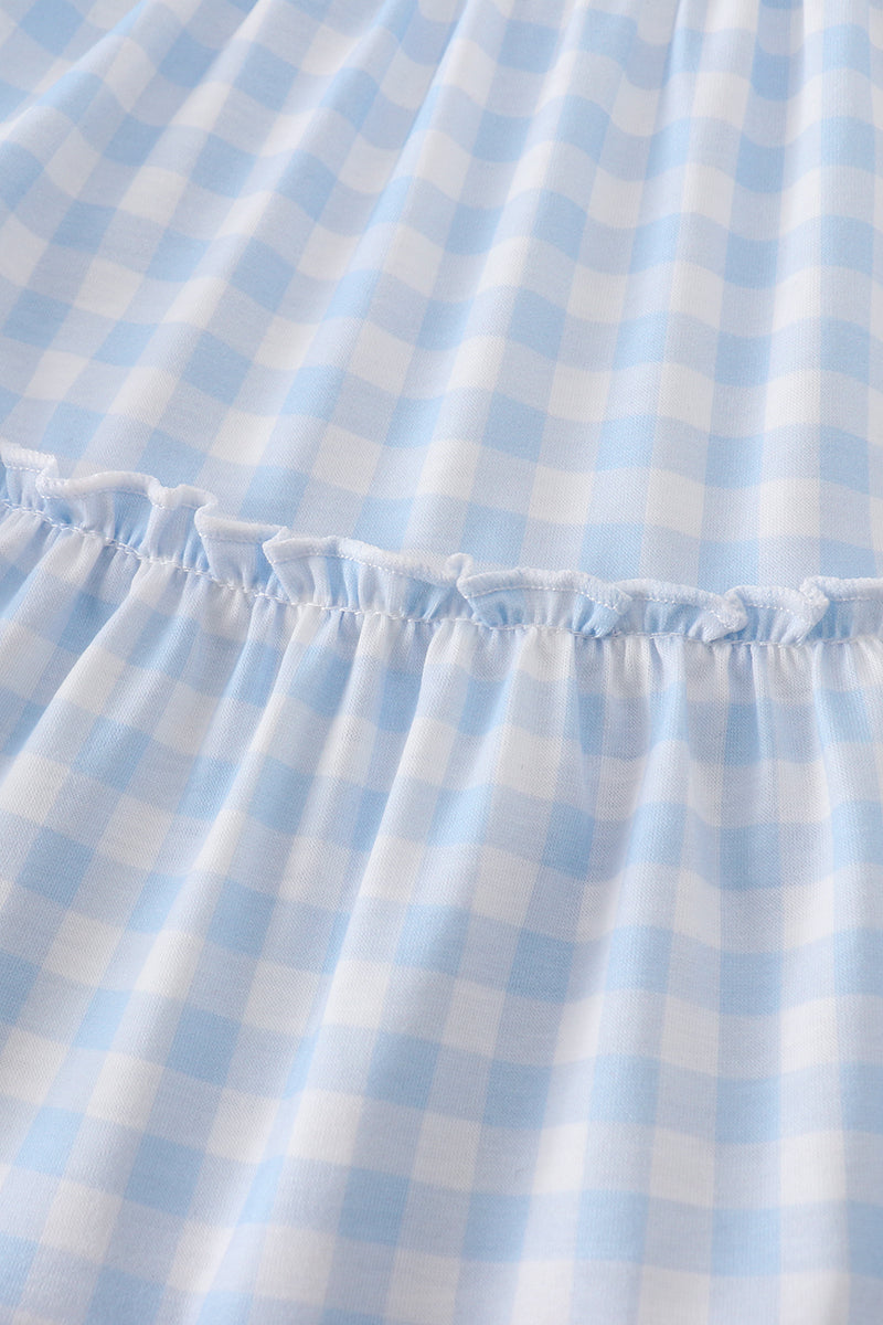A charming blue tiered dress with playful farm-themed embroidery, perfect for kids.