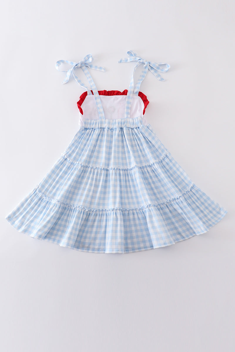 A charming blue tiered dress with playful farm-themed embroidery, perfect for kids.