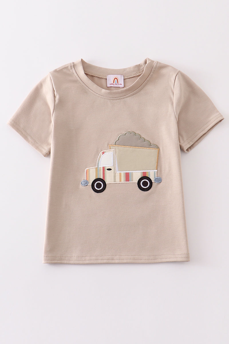 Khaki long-sleeve top with colorful truck applique, perfect for playful adventures.