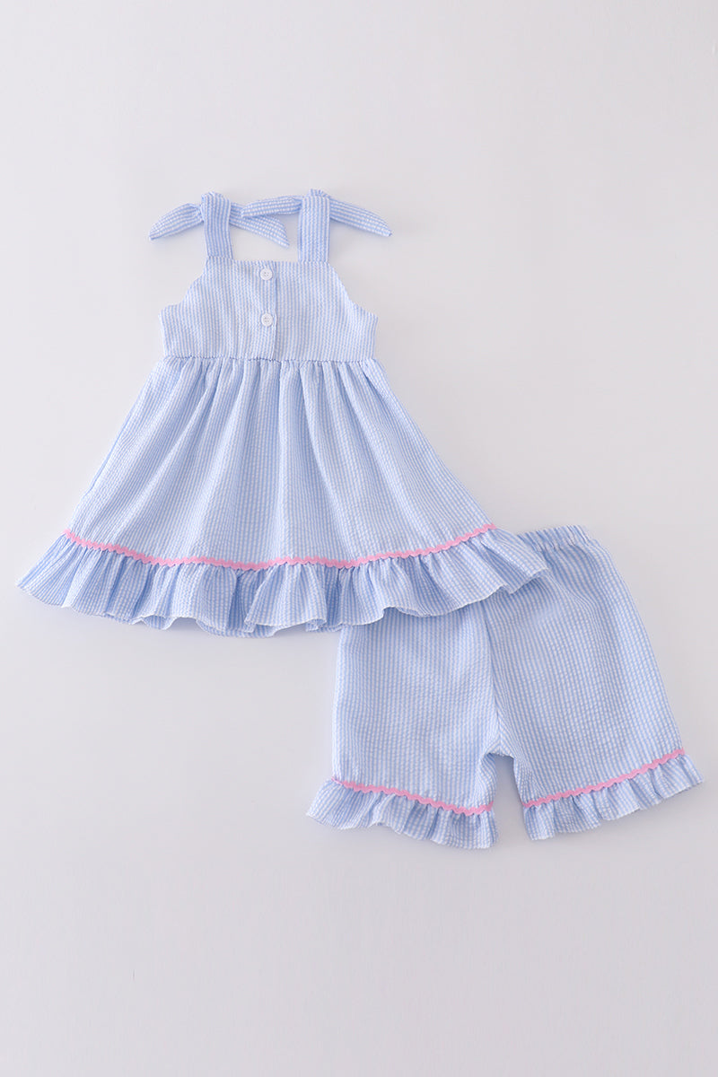 Blue seersucker set with adorable whale embroidery, perfect for summer adventures.