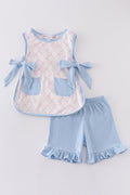 A cute pink bow shorts set for girls, perfect for playful summer days.