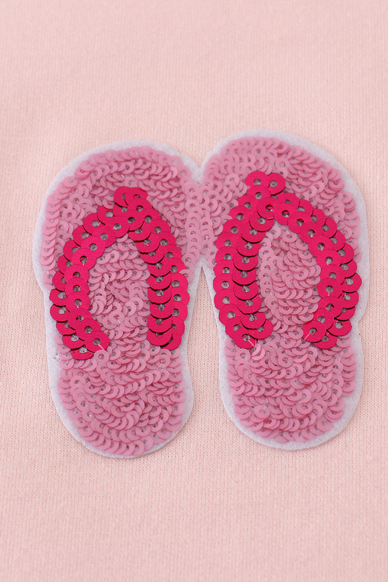 Matching pink sequin dresses with slippers, perfect for mom and daughter twinning.