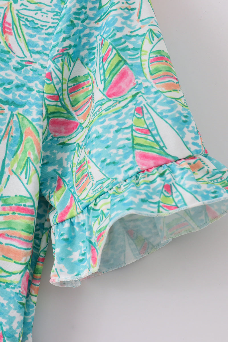Teal tiered dress with sailboat print, perfect for matching mom and me outfits.