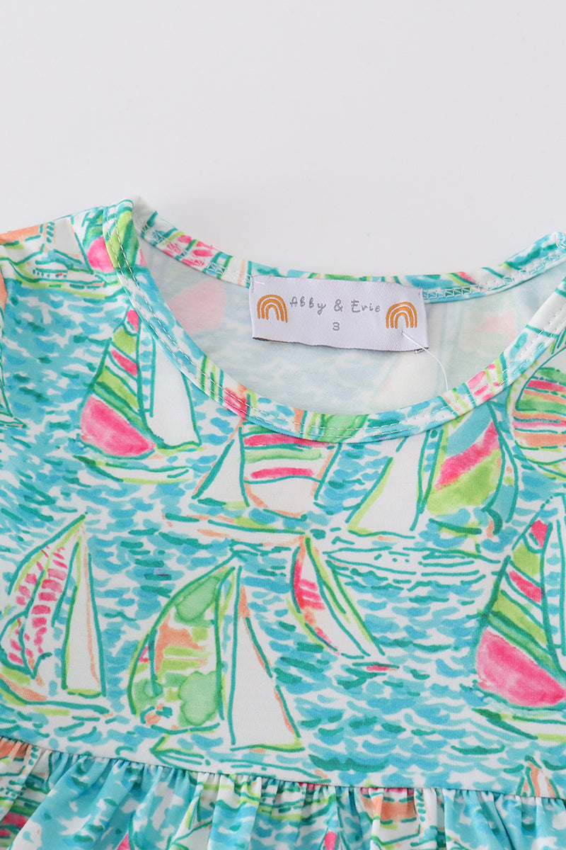 Teal tiered dress with sailboat print, perfect for matching mom and me outfits.