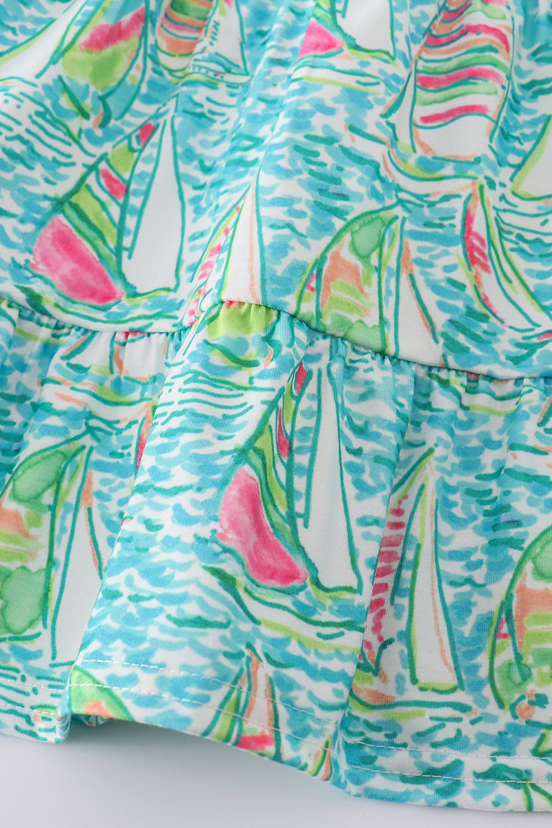 Teal tiered dress with sailboat print, perfect for matching mom and me outfits.