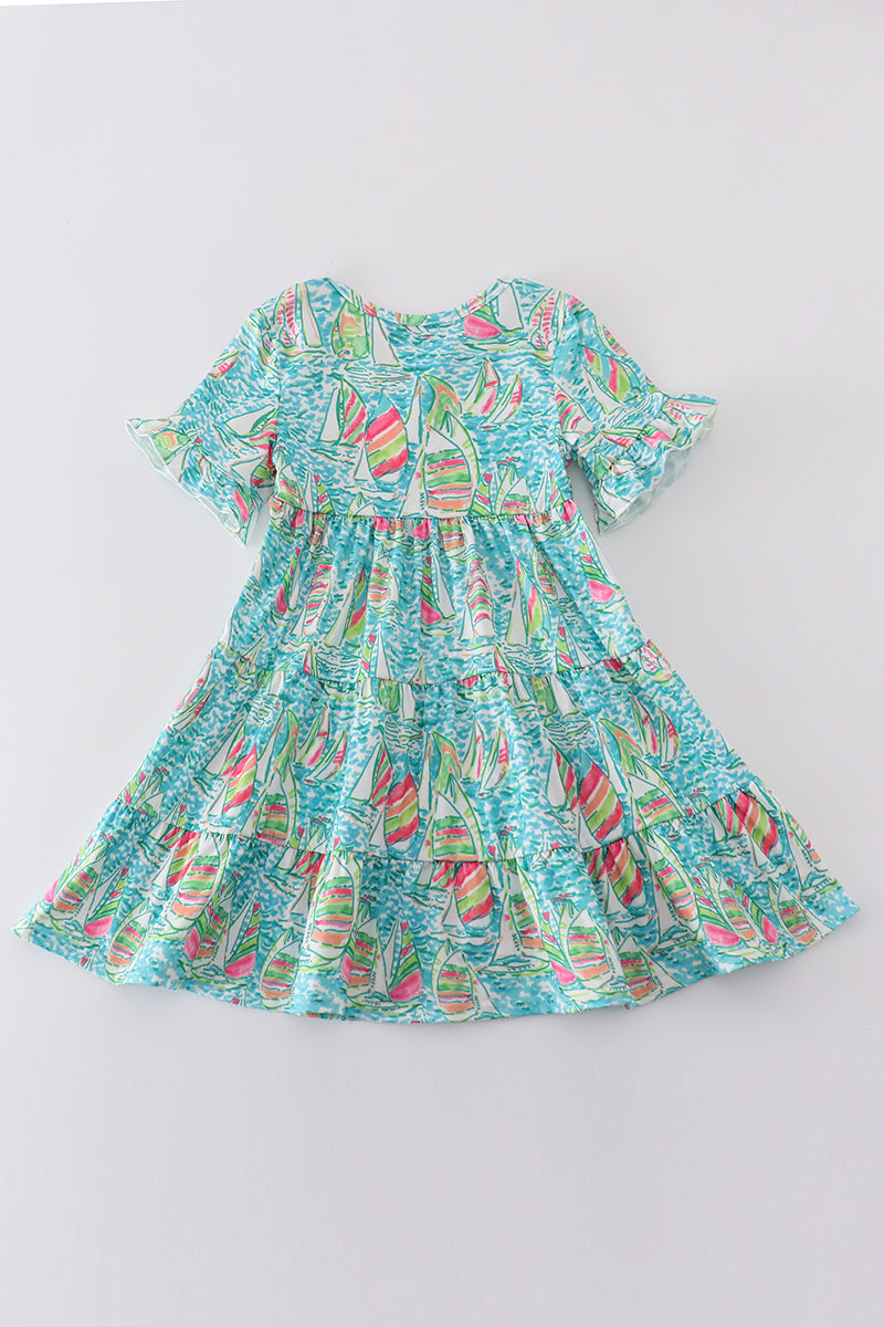 Teal tiered dress with sailboat print, perfect for matching mom and me outfits.