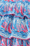 Matching mom and me dresses with playful blue sailboat print, perfect for summer outings.