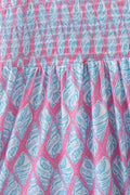 Matching blue smocked dresses with ribbon lace detailing for mom and daughter.