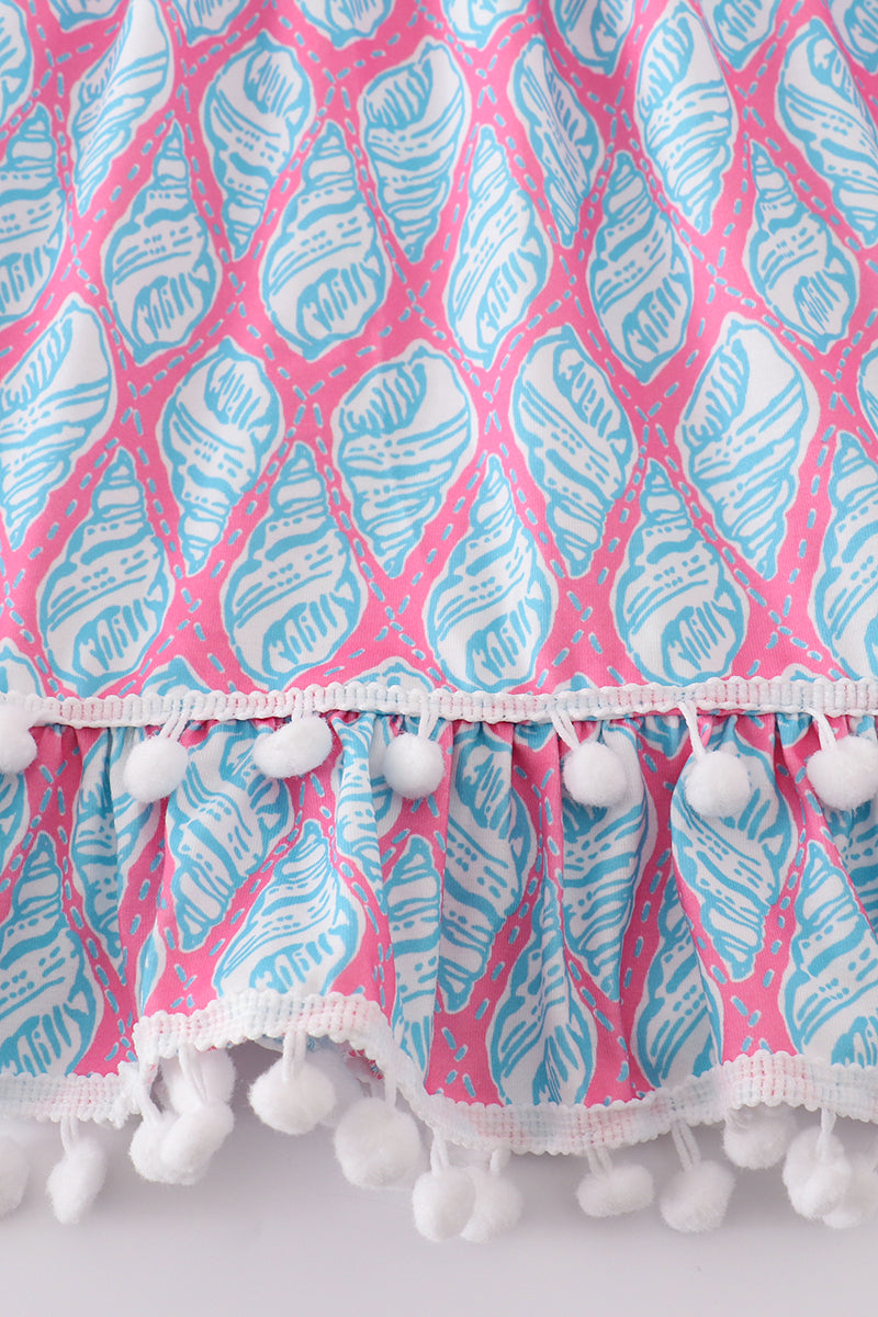 Matching blue smocked dresses with ribbon lace detailing for mom and daughter.