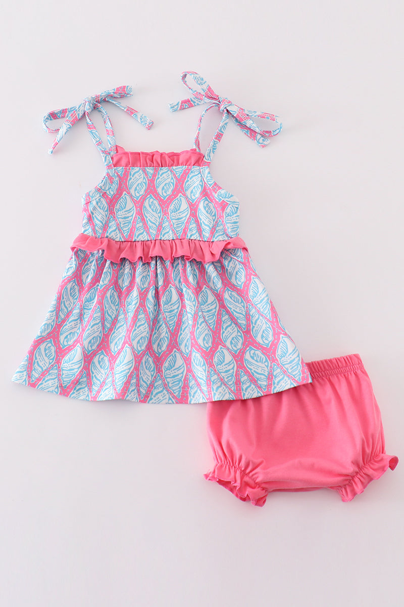 Adorable blue bloomer set with ribbon charm, perfect for playful little girls.