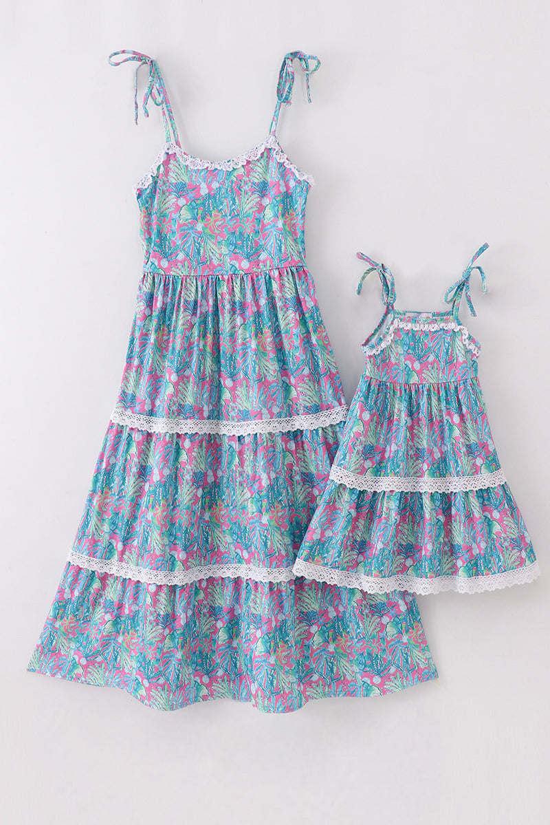 Green jungle bloom tiered dress with matching mom&me style from Sandilake Clothing.