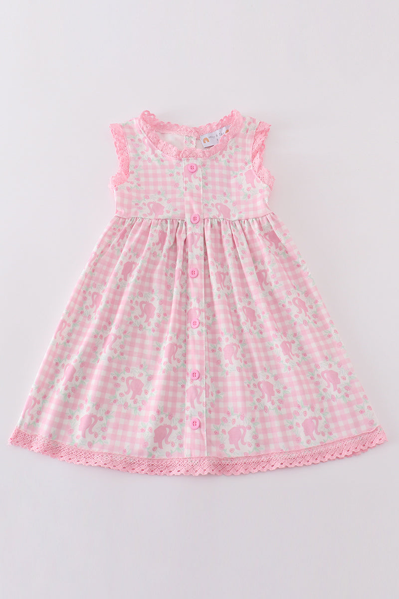 Pink Barbie print dress for girls, featuring playful, colorful patterns.