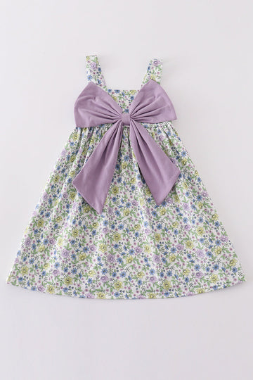 Purple floral girl dress with a bow, perfect for special occasions.